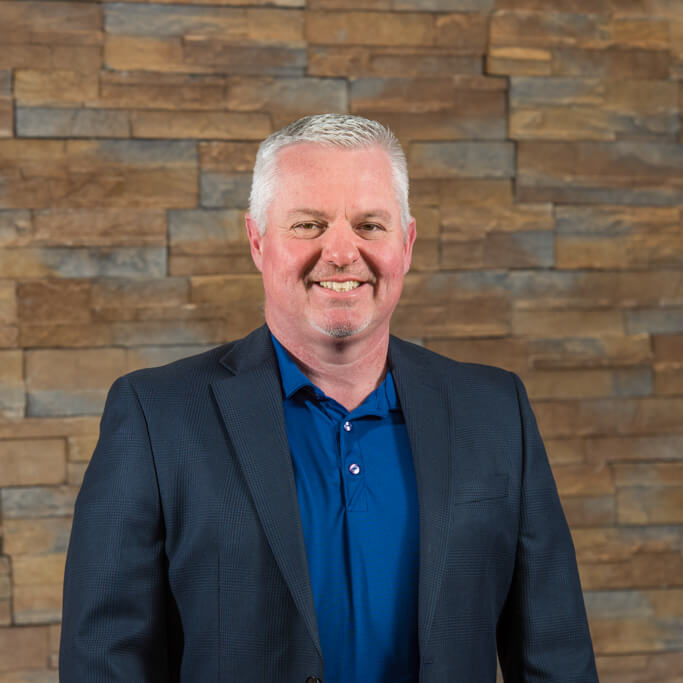 headshot of cj hall project manager at empire construction